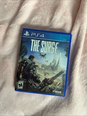 Sony PS4 The Surge - Blue Case with Black Disc